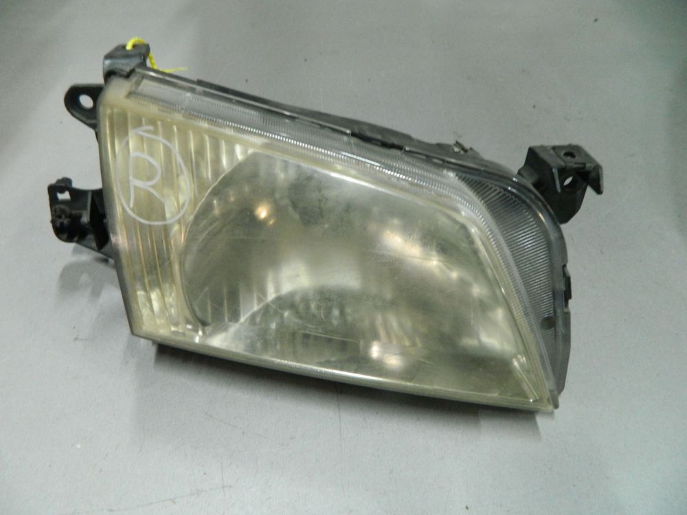 Фара MAZDA DEMIO DW3W Перед Прав 1001 (Контрактный) 64492776