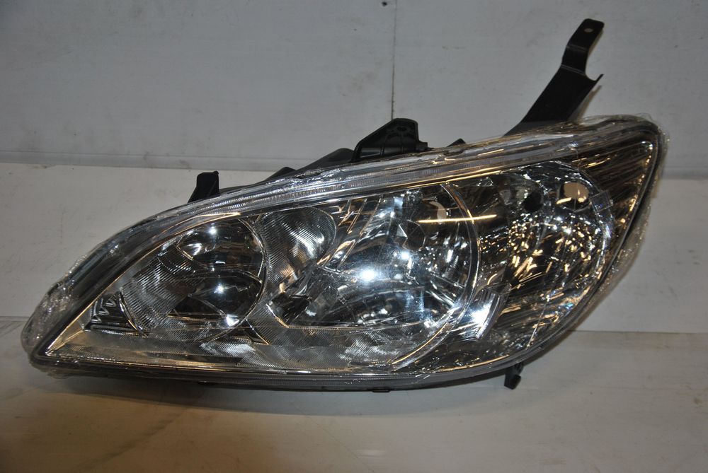 Фара TYC TG-217-1146L-LD-EM