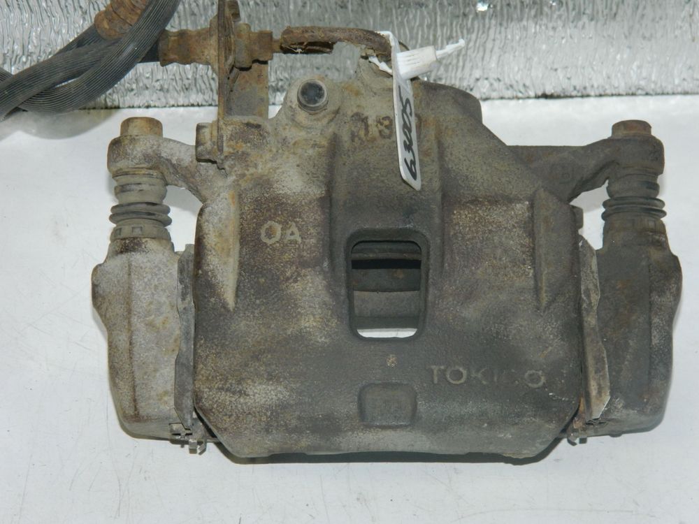 Суппорт MITSUBISHI L200 4D56 Перед Прав (Б/У) 63005