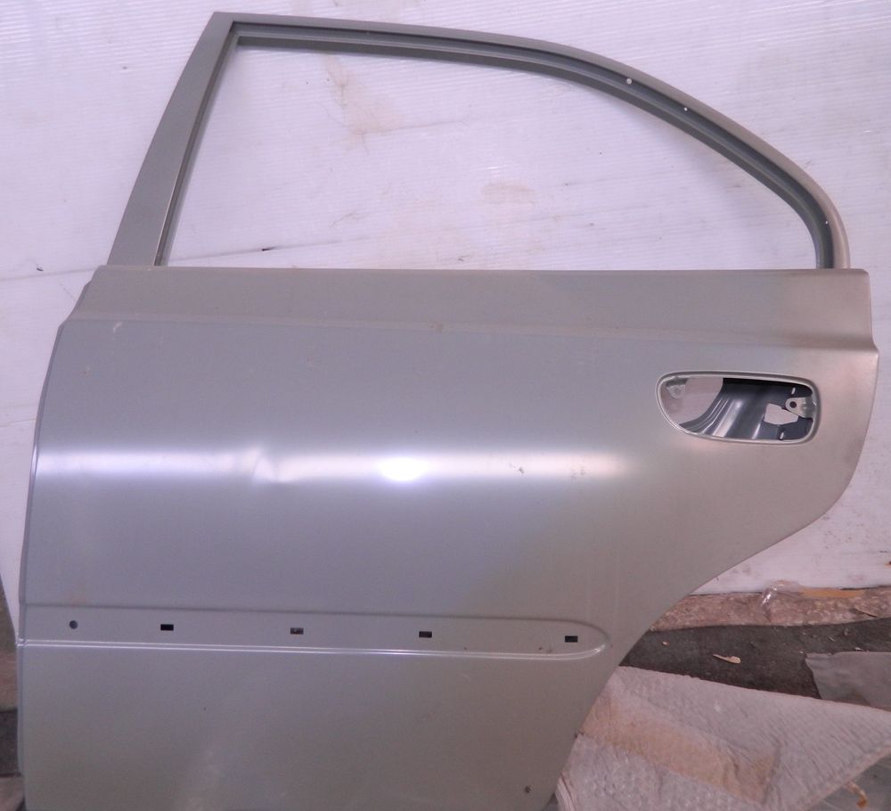 Дверь HYUNDAI/KIA 7700325001 HYUNDAI ACCENT LC Зад Лев 1999 - 2012 (Уценка)
