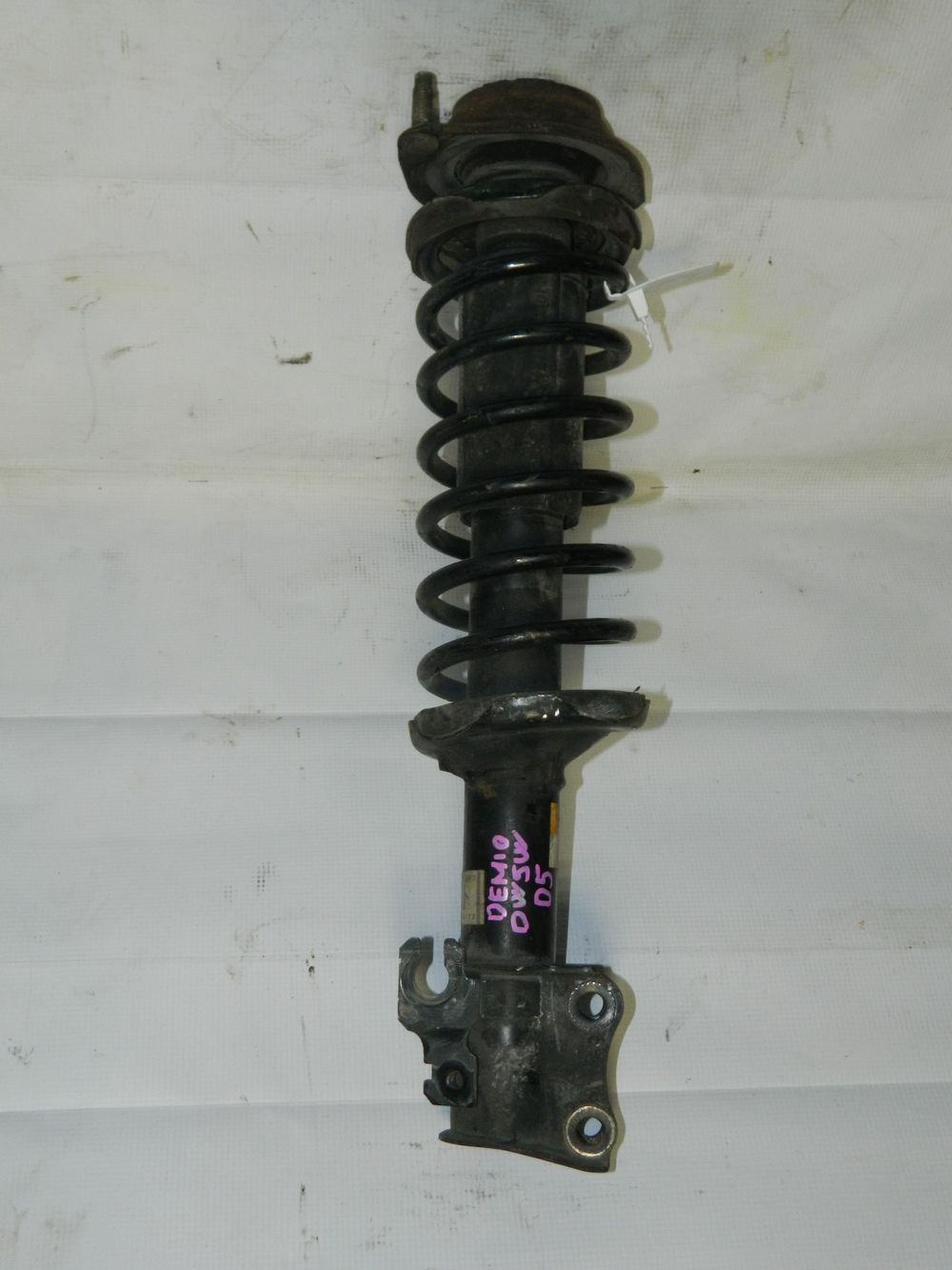 Стойка подвески MAZDA DEMIO DW3W Перед Лев (Контрактный) 35021048