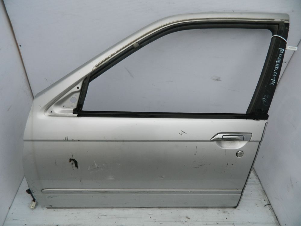 Дверь NISSAN BLUEBIRD EU14 Перед Лев (Контрактный) 35021545