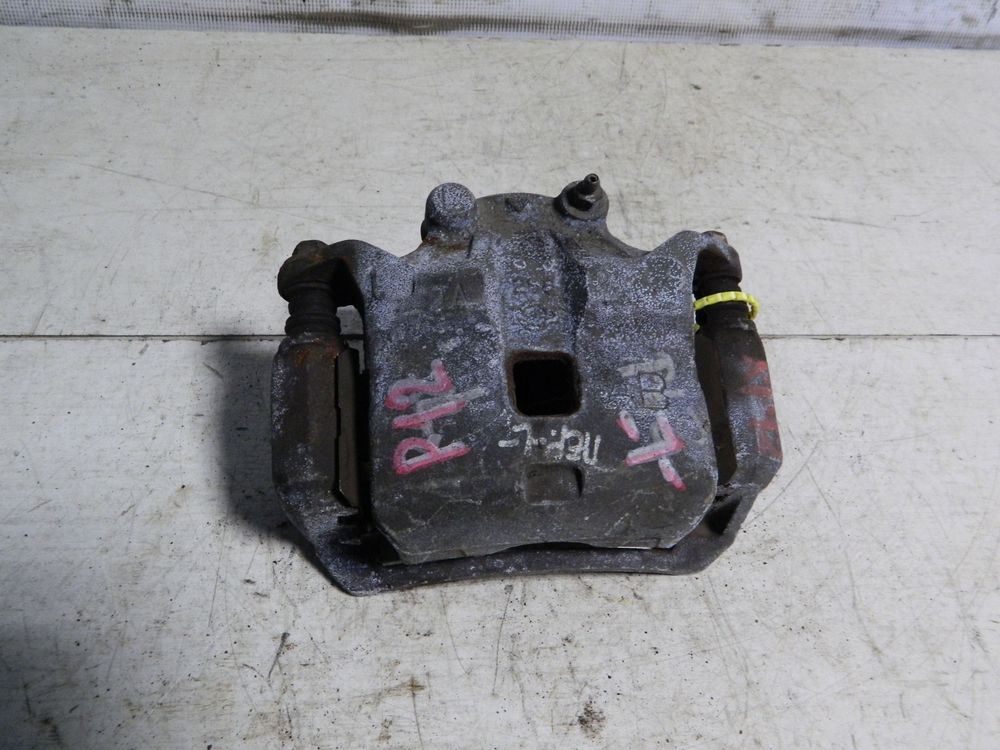 Суппорт NISSAN PRIMERA TP12 Перед Лев (Контрактный) 79773433