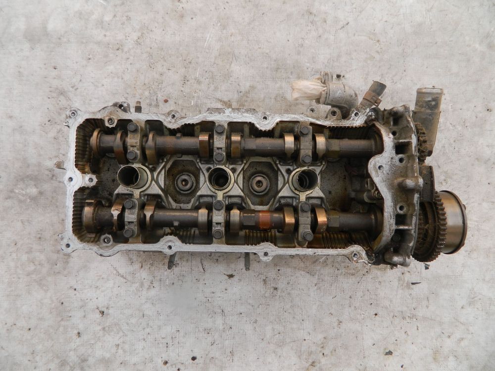 Головка блока цилиндров NISSAN VQ25DE Лев (Контрактный) 79768964