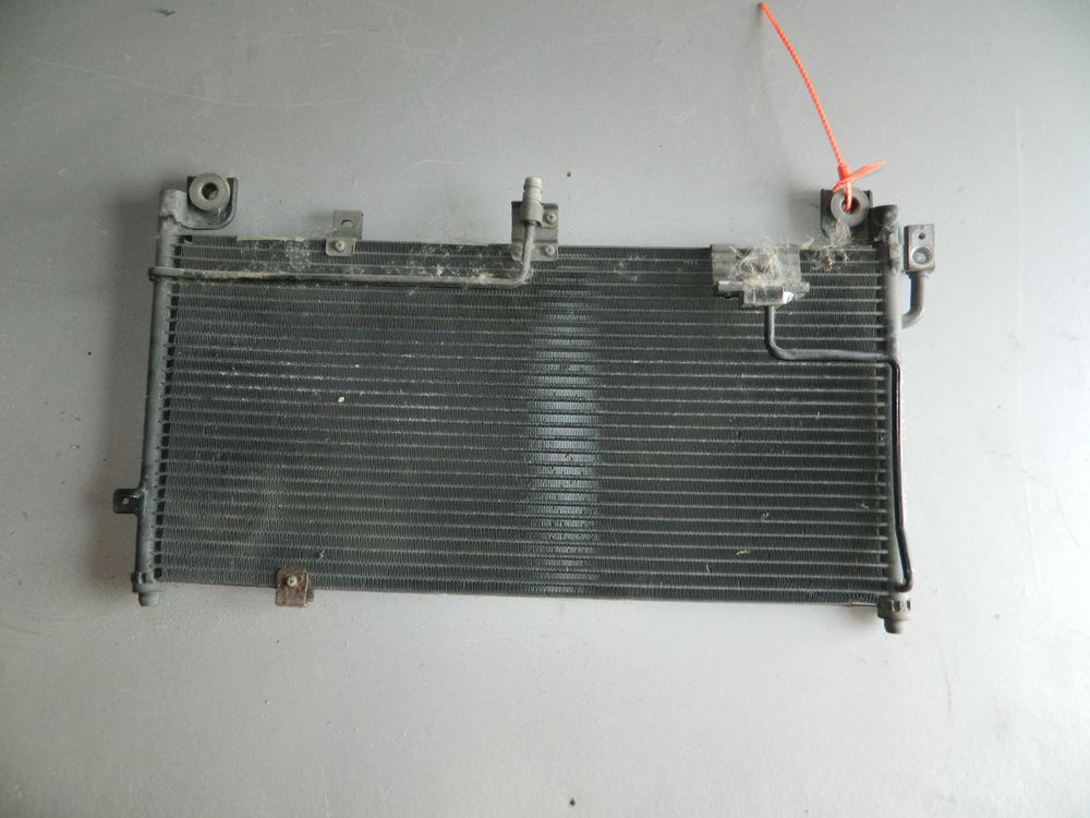 Радиатор кондиционера MAZDA FAMILIA BHALP (Контрактный) 72367363