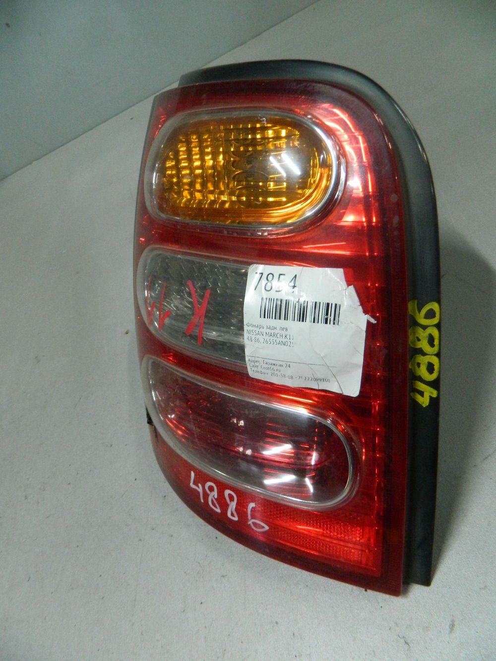 Фонарь NISSAN MARCH K11 Задн Лев 4886 (Контрактный) 64492002
