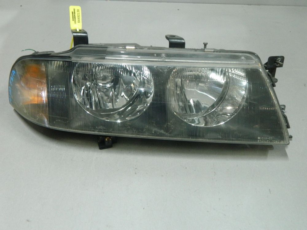 Фара MITSUBISHI DIAMANTE F31A Перед Прав 7090 (Контрактный) 64492139
