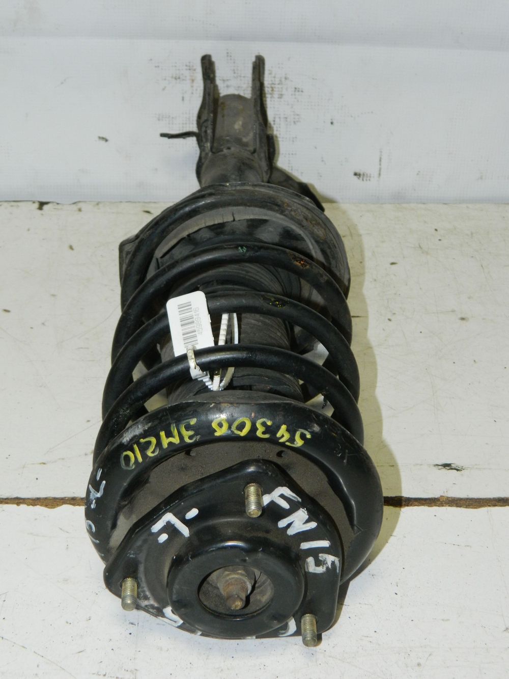 Стойка подвески NISSAN PULSAR FN15 Перед Лев (Контрактный) 45989416