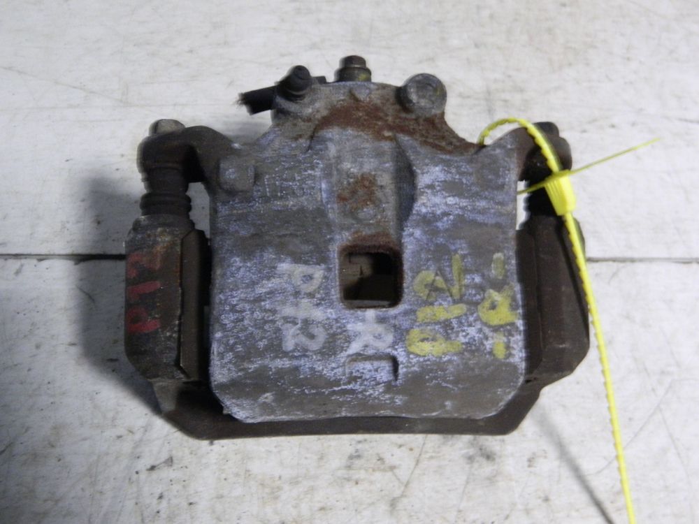 Суппорт NISSAN PRIMERA TP12 Перед Лев (Контрактный) 79773355