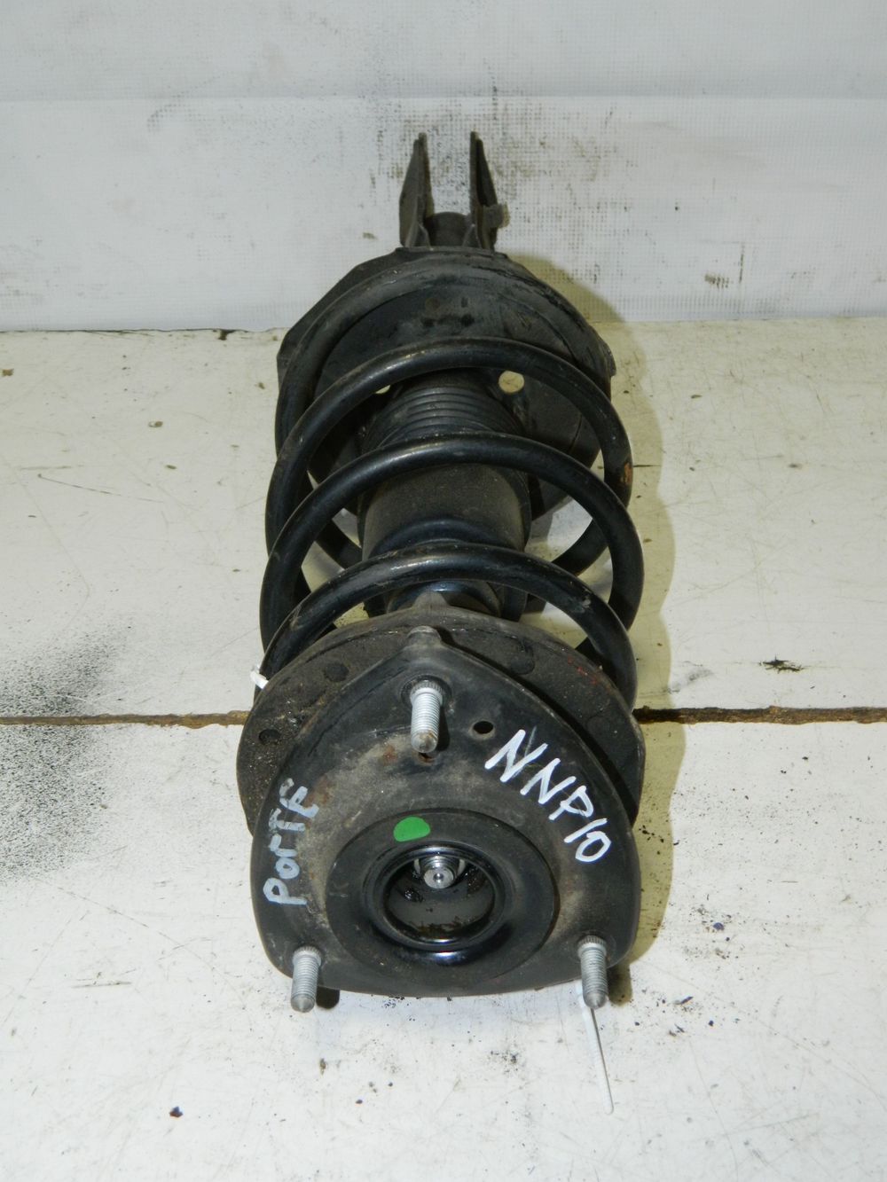 Стойка подвески TOYOTA PORTE NNP10 Перед Лев (Контрактный) 45989577
