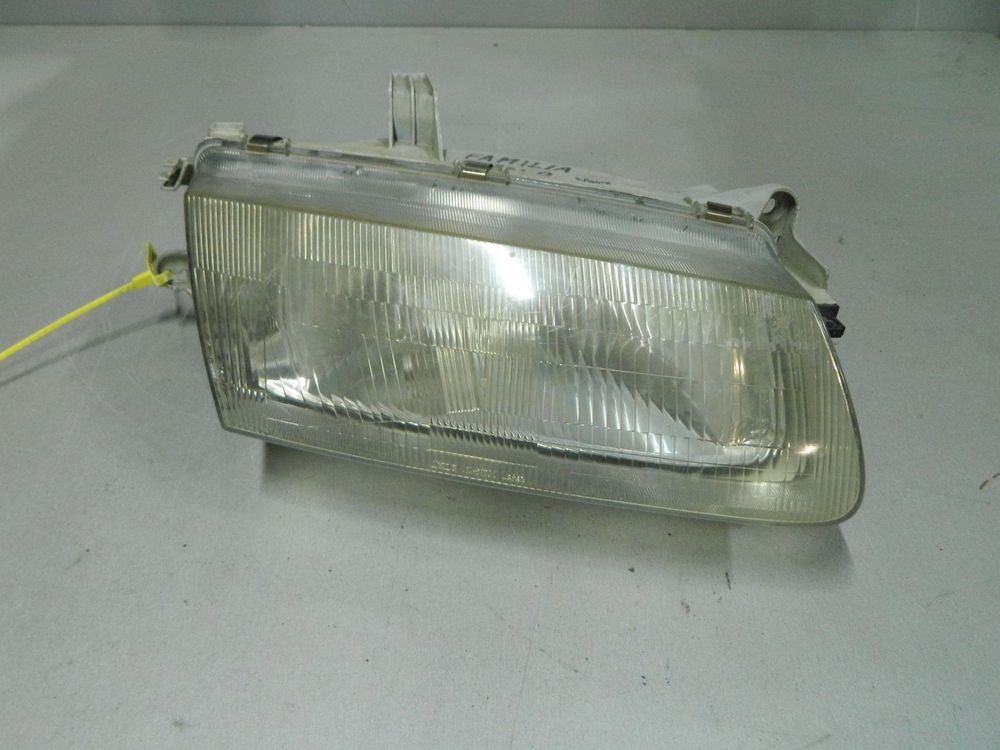 Фара MAZDA FAMILIA BHALP Перед Прав (Контрактный) 64492546