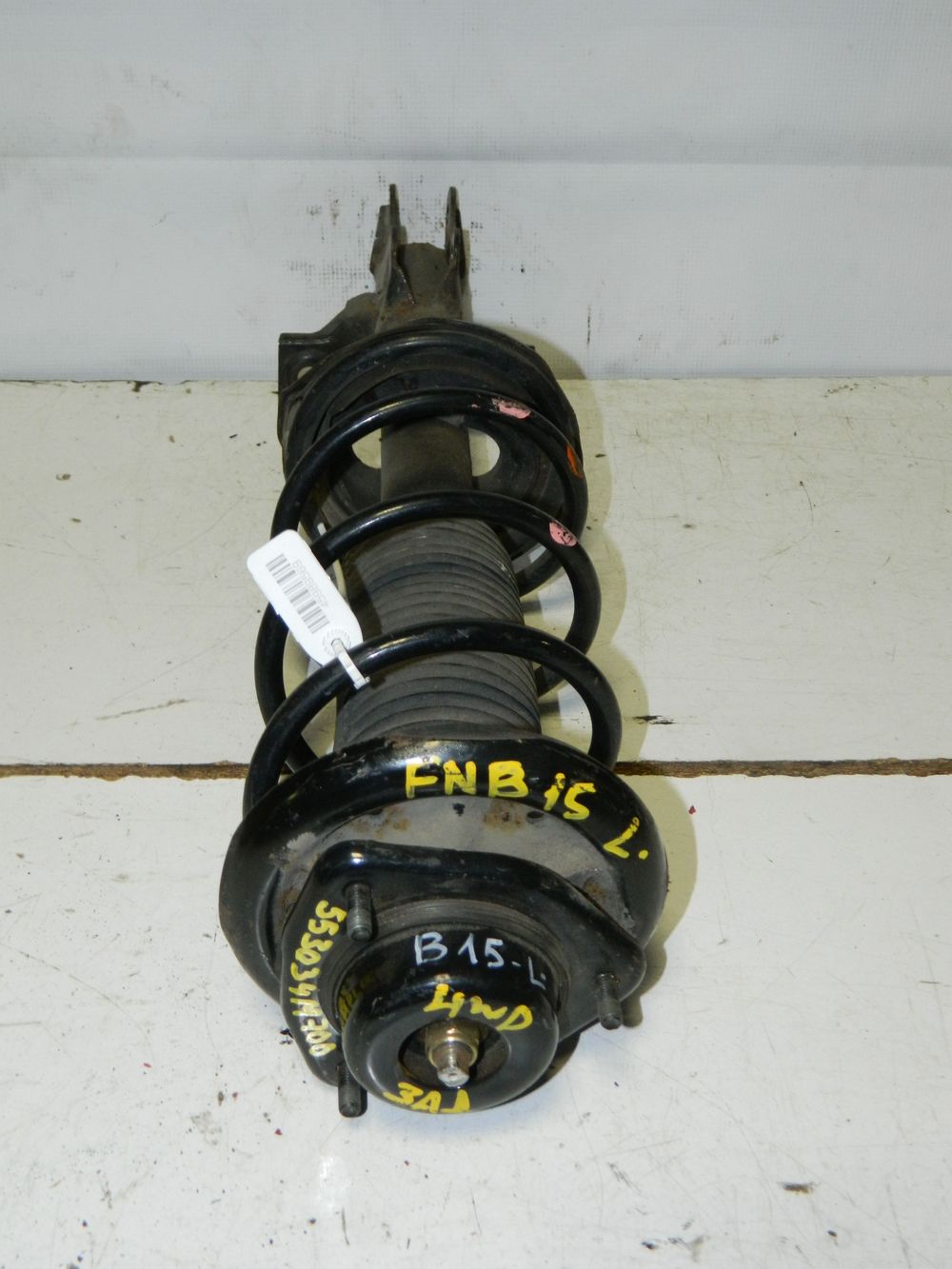 Стойка подвески NISSAN SUNNY FNB15 QG15 Зад Лев (Контрактный) 45989569