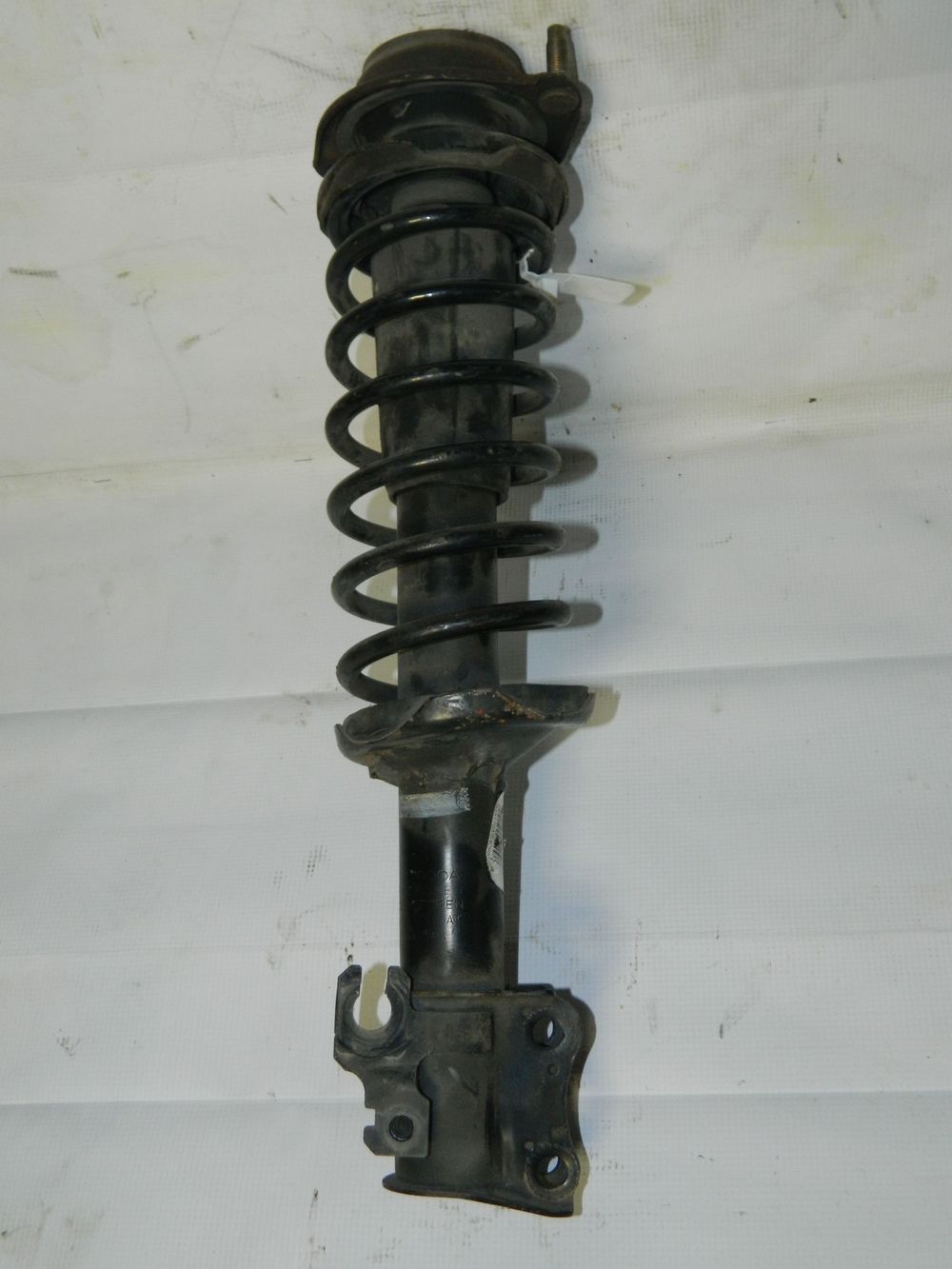 Стойка подвески MAZDA DEMIO DW3W B3 Перед Лев (Контрактный) 35021050