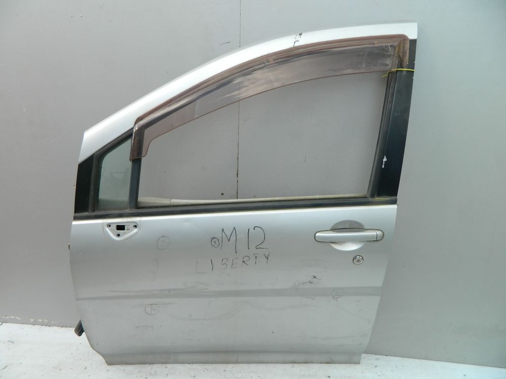 Дверь NISSAN LIBERTY PM12 Перед Лев (Контрактный) 40951943