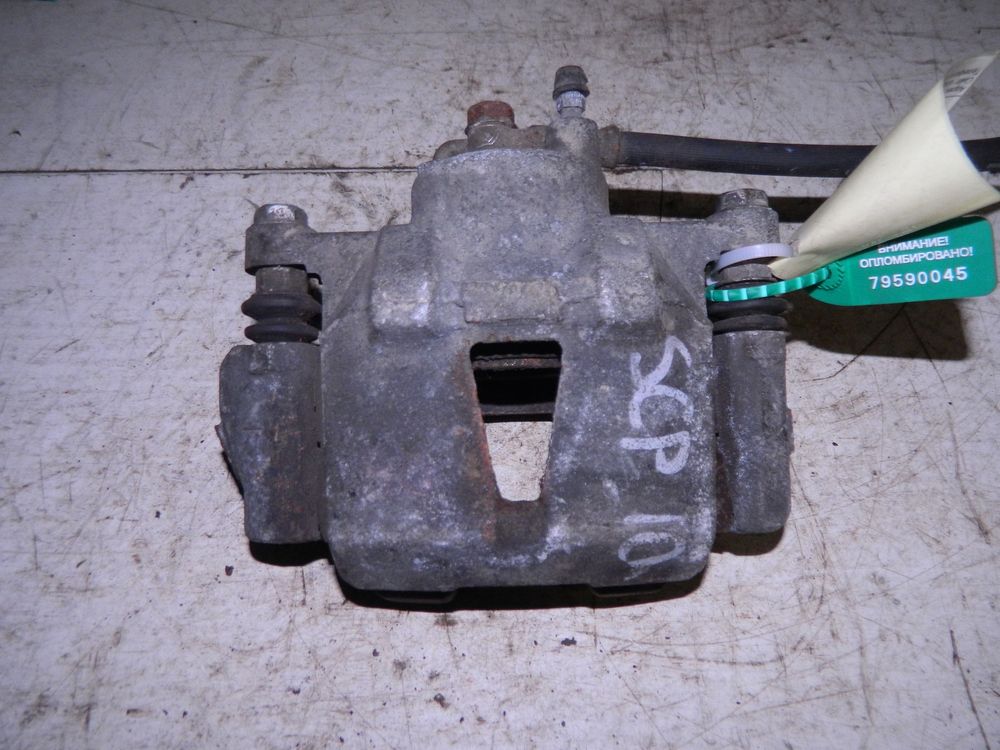 Суппорт TOYOTA VITZ SCP10 Перед Лев (Контрактный) 79590045