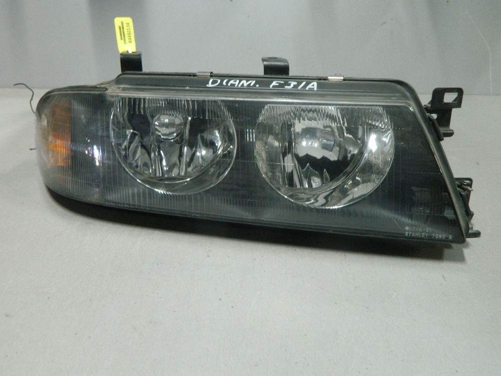Фара MITSUBISHI DIAMANTE F31A Перед Прав 7090 (Контрактный) 64492134