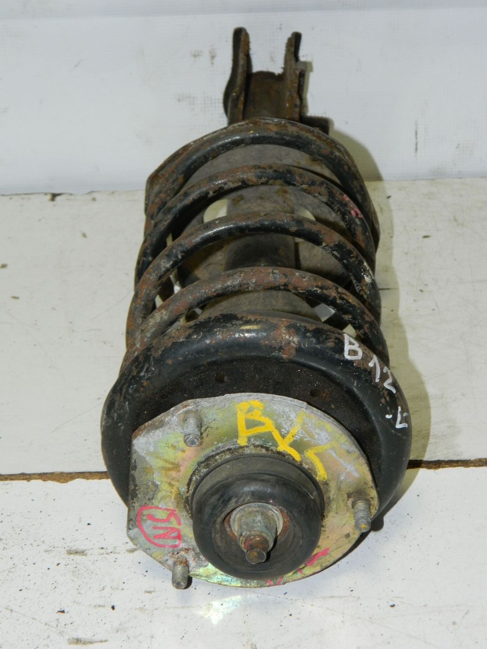 Стойка подвески NISSAN SUNNY B12 Перед Лев (Контрактный) 45989708