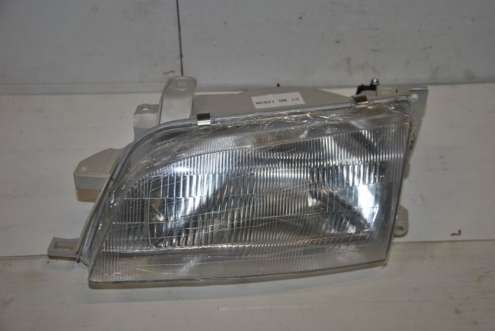 Фара SAT ST2121147L Перед. Лев. TOYOTA CARINA E, CORONA 1992-1996