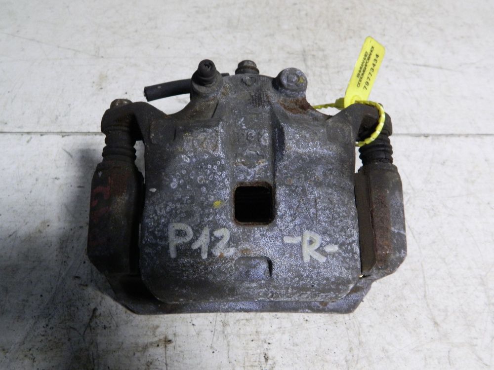 Суппорт NISSAN PRIMERA TP12 Перед Прав (Контрактный) 79773434