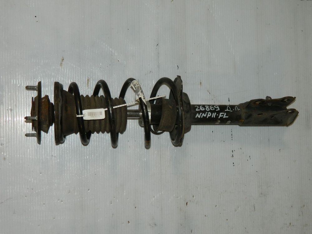 Стойка подвески TOYOTA PORTE NNP11 Перед Лев (Контрактный)