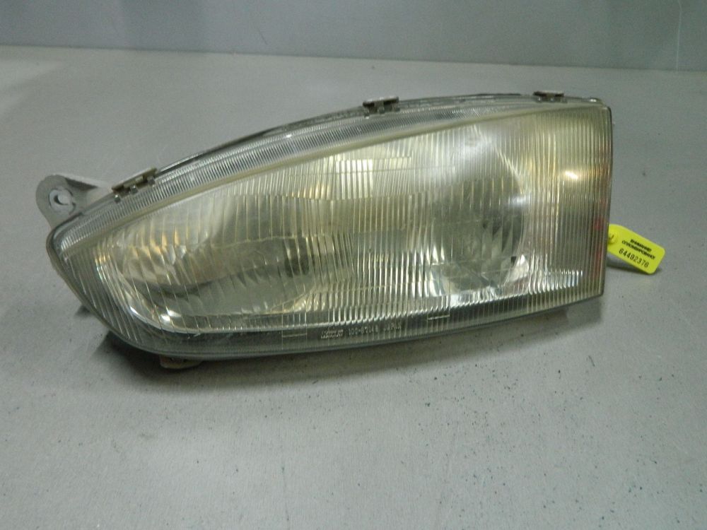 Фара MITSUBISHI MIRAGE CJ1A Перед Лев (Контрактный) 64492376