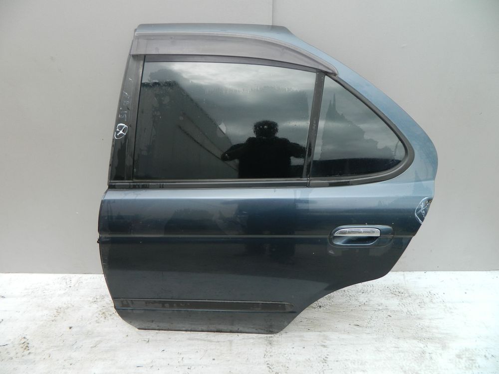 Дверь NISSAN SUNNY B15 Зад Лев (Контрактный) 40951539