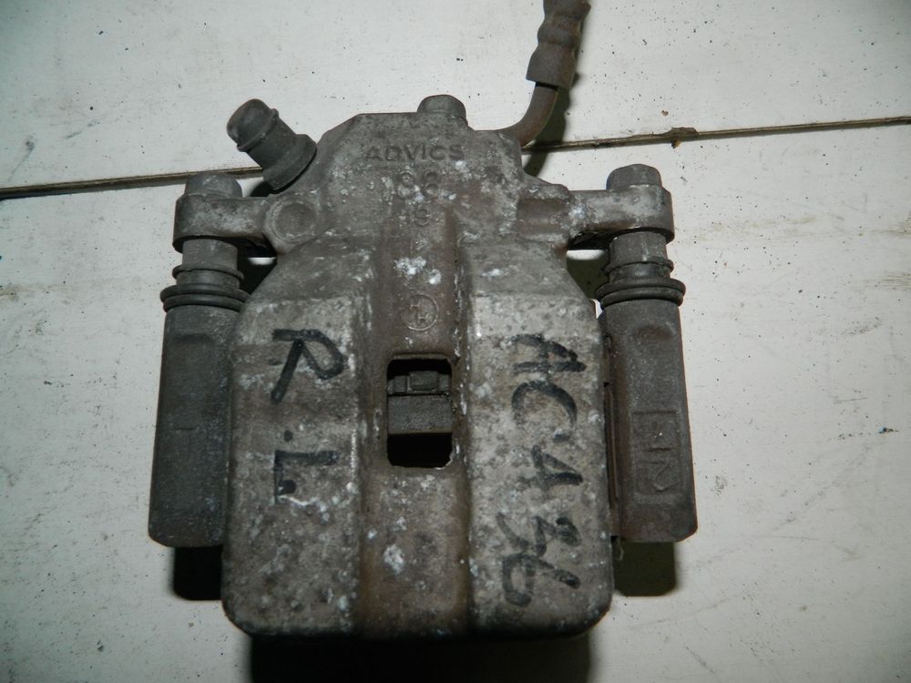Суппорт TOYOTA RAV4 ACA36 Зад Лев (Контрактный) 180296014