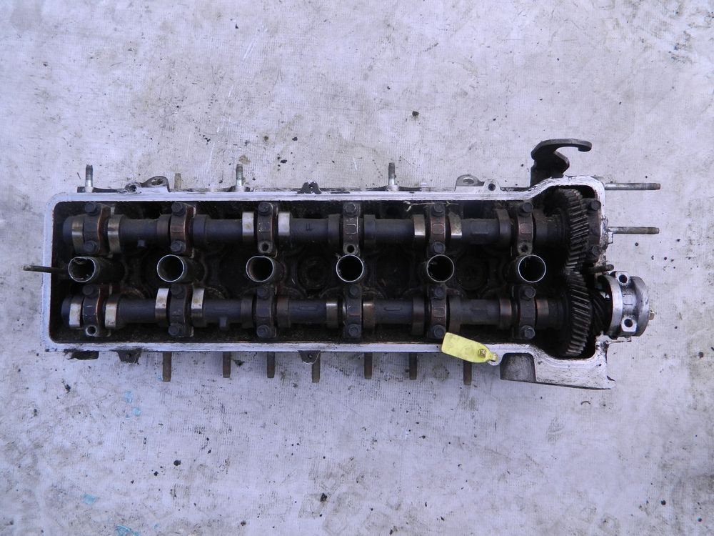 Головка блока цилиндров TOYOTA 1GFE (Б/У) 79769000