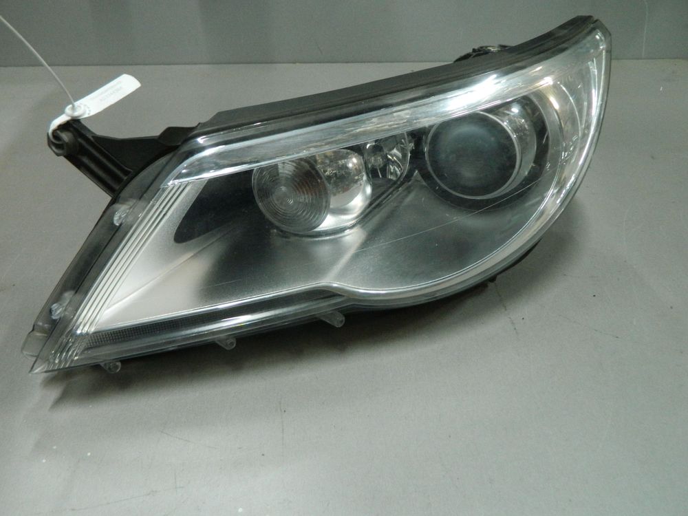 Фара VOLKSWAGEN TIGUAN 5N1 Перед Лев (Контрактный) 03344384