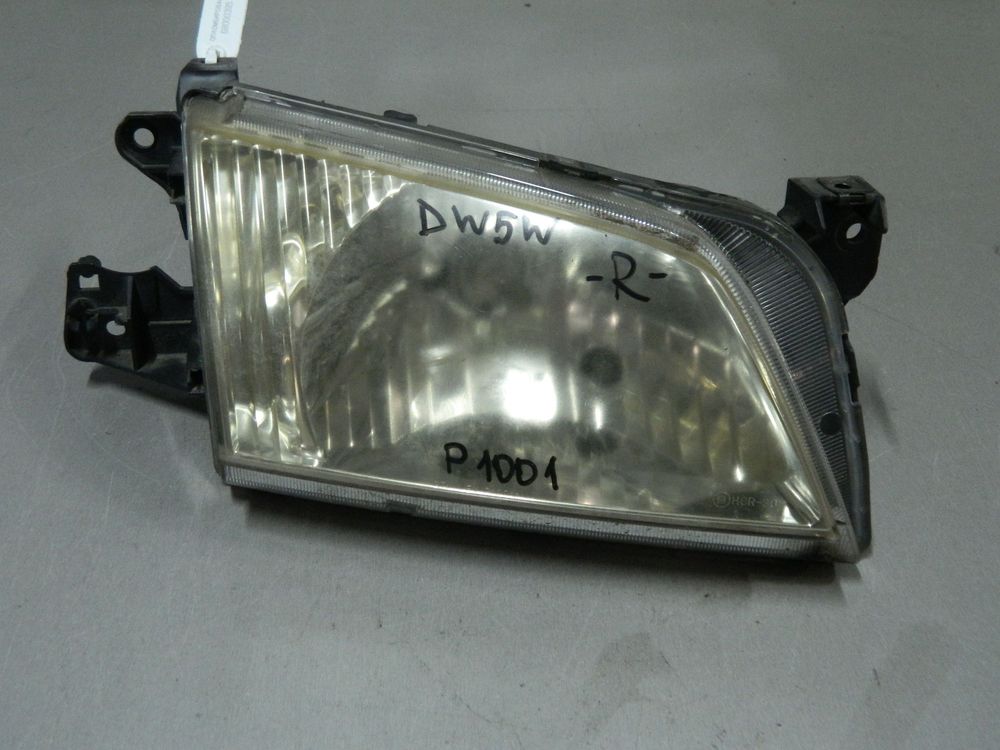 Фара MAZDA DEMIO DW3W Перед Прав 1001 (Контрактный) 68000395