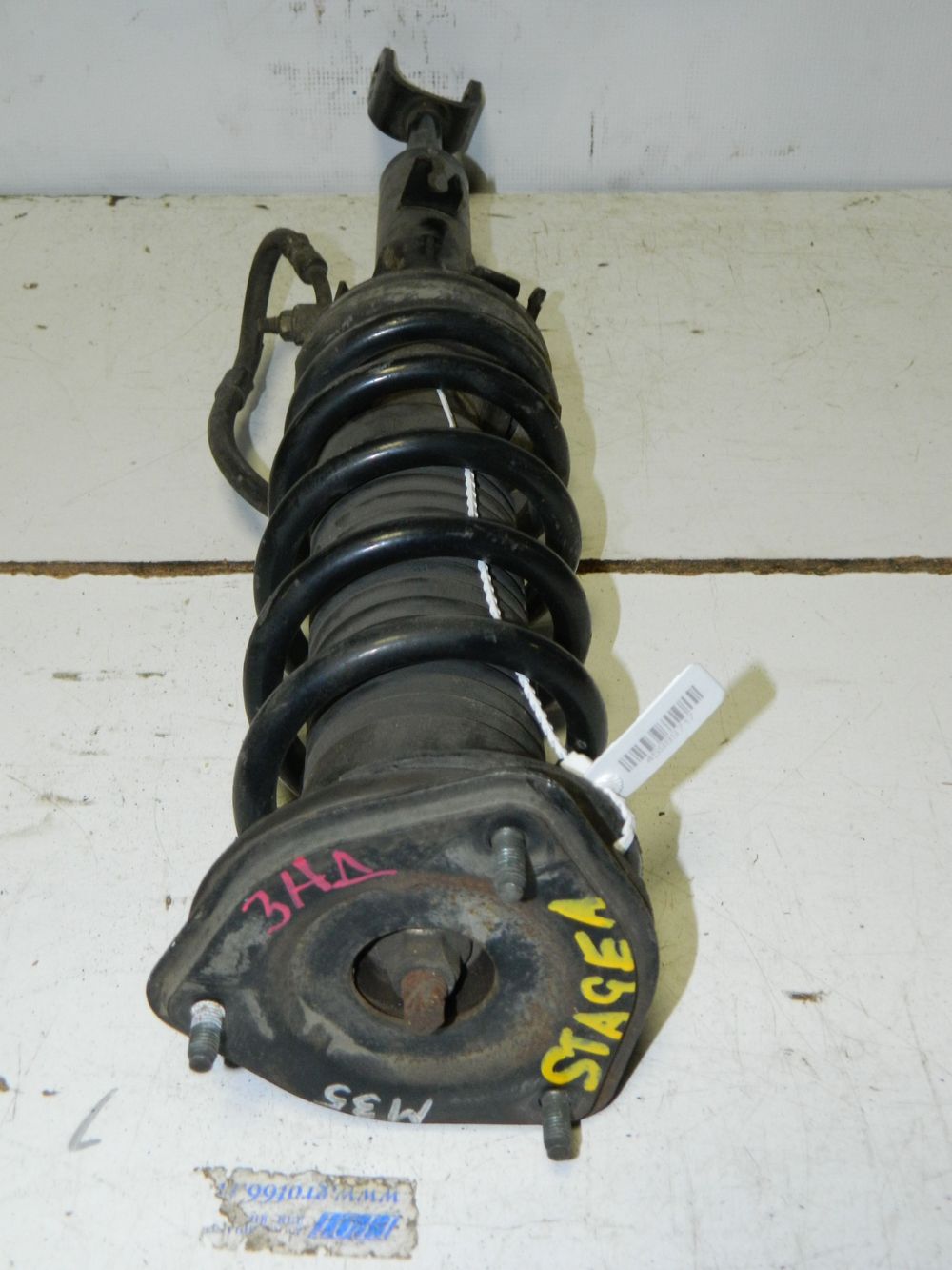Стойка подвески NISSAN STAGEA M35 Перед Лев  (Контрактный) 45989717