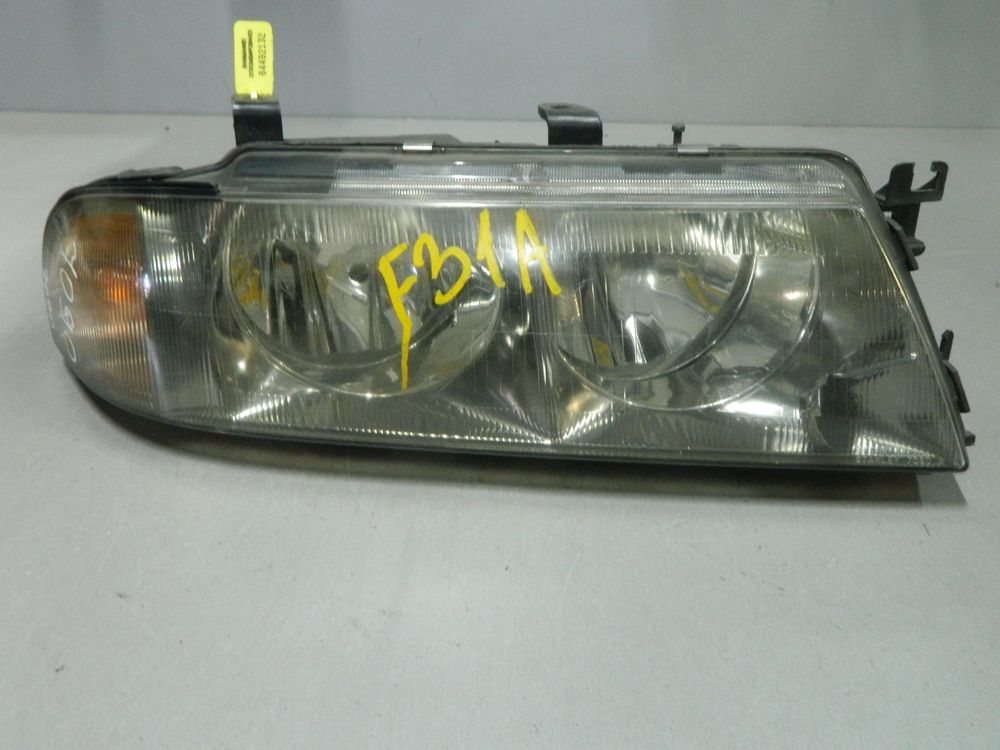 Фара MITSUBISHI DIAMANTE F31A Перед Прав 7090 (Контрактный) 64492132