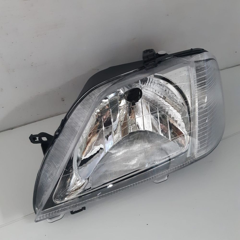 Фара SAT ST5511153L RENAULT LOGAN 05-10 (хрусталь, с корректором) Перед Лев
