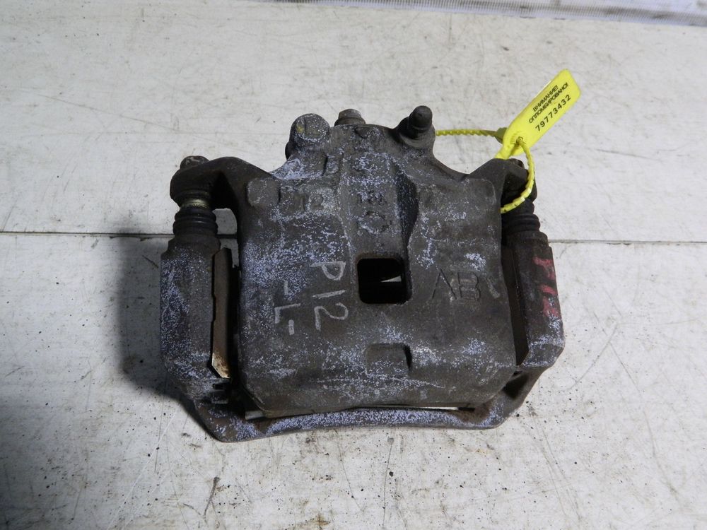 Суппорт NISSAN PRIMERA TP12 Перед Лев (Контрактный) 79773432