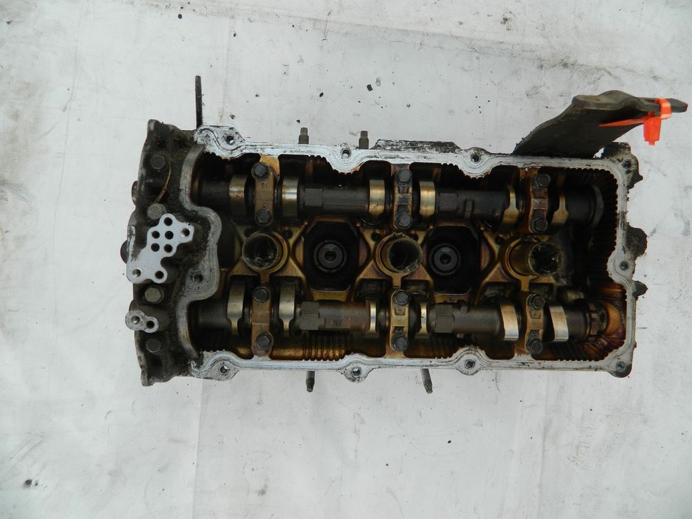 Головка блока цилиндров NISSAN VQ23DE Прав (Контрактный) 72367213