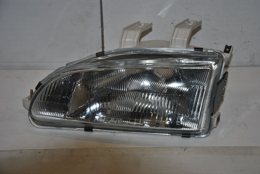 Фара DJAUTO HHD1062L000 Перед. Лев. HONDA CIVIC EG8 1991-1995
