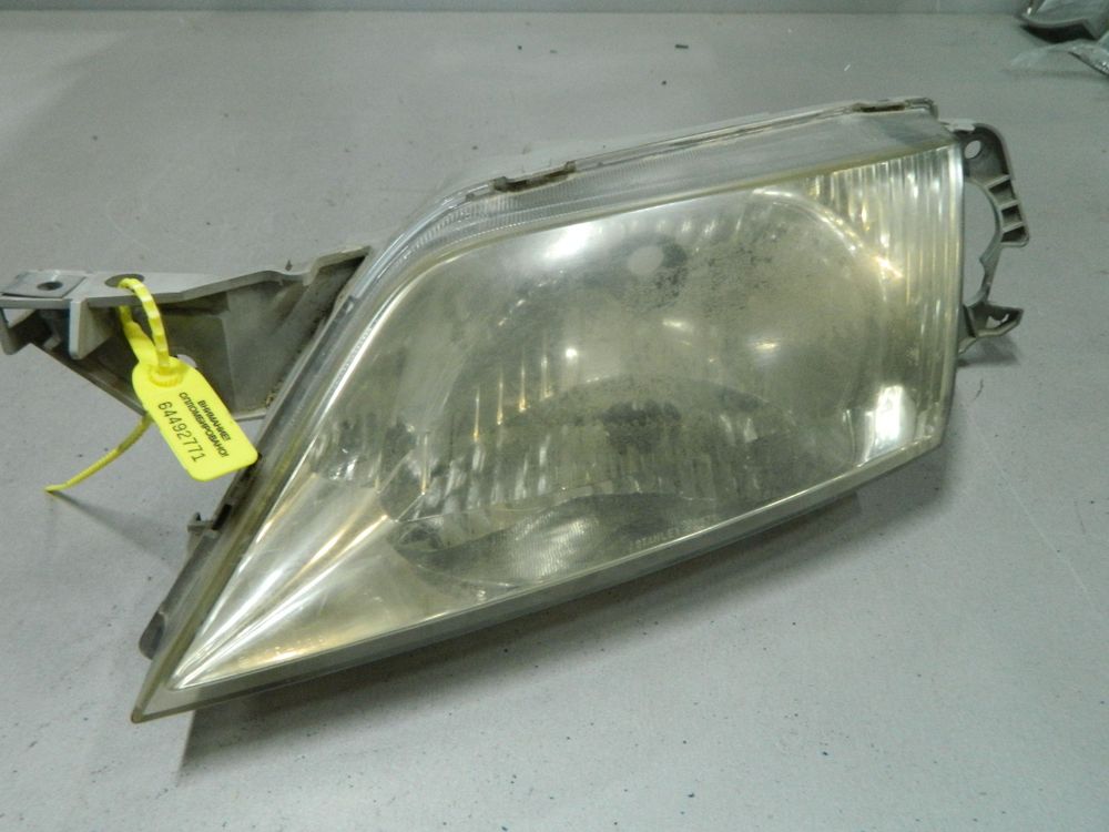 Фара MAZDA PREMACY CP8W Перед Лев 0571 (Контрактный) 64492771