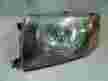 Фара MITSUBISHI PAJERO IO H76W Перед Лев (Контрактный) 64492414
