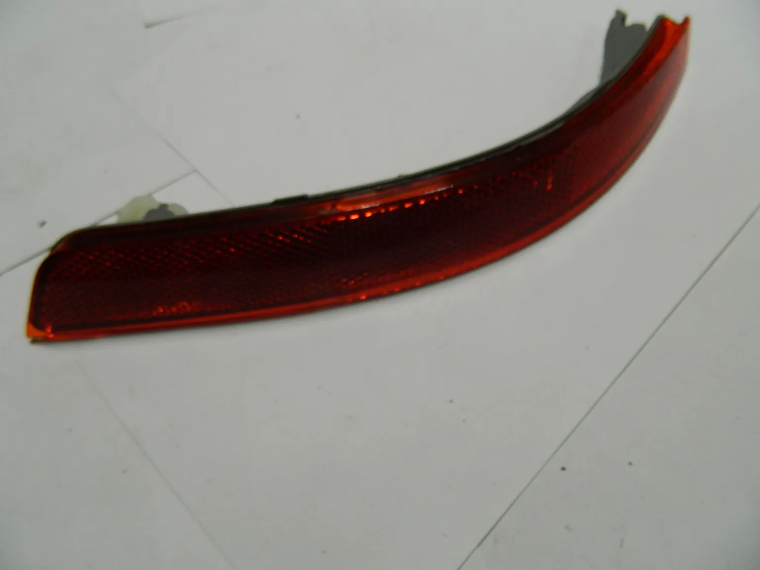 Отражатель в бампер NISSAN 26560EW00A