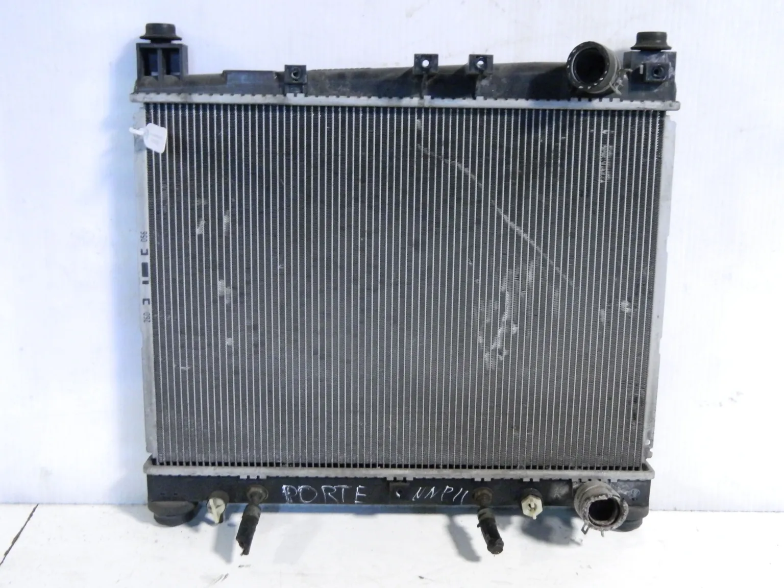 Радиатор ДВС TOYOTA PORTE NNP11 (Контрактный) 69586282