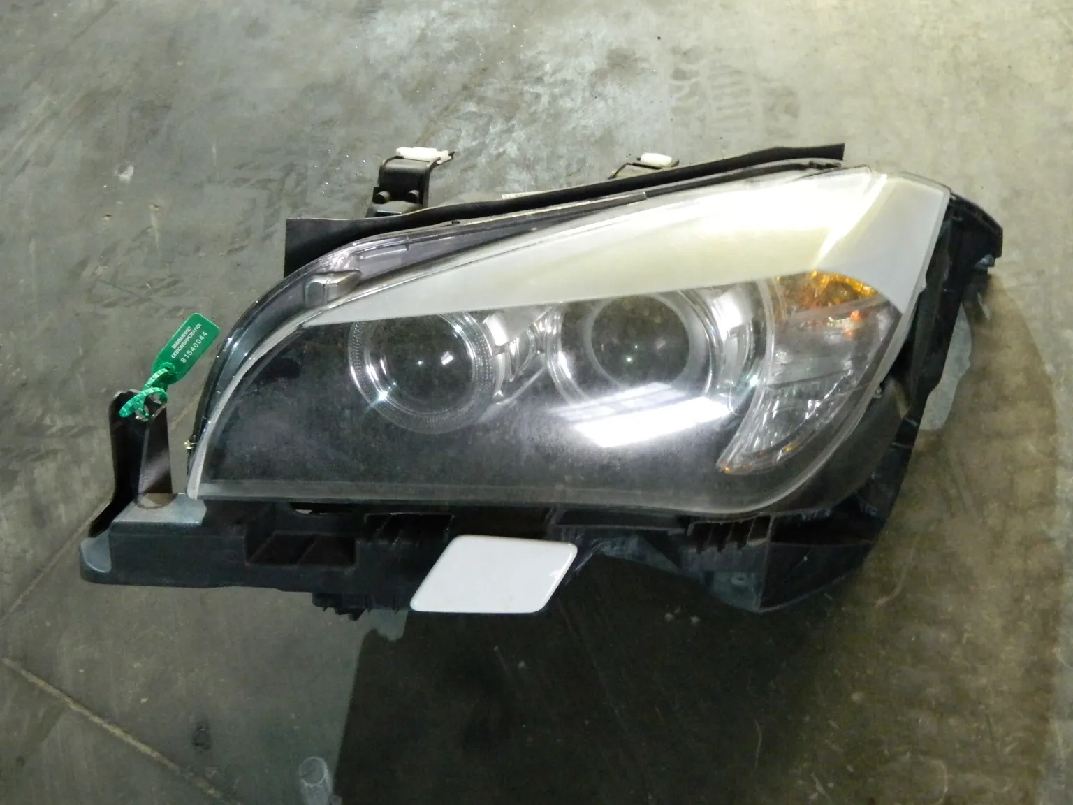 Фара BMW X1 E84 Перед Лев (Контрактный) 81540044