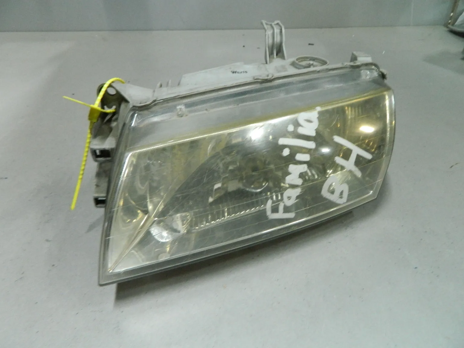 Фара MAZDA FAMILIA BHALP Перед Лев (Контрактный) 64492718