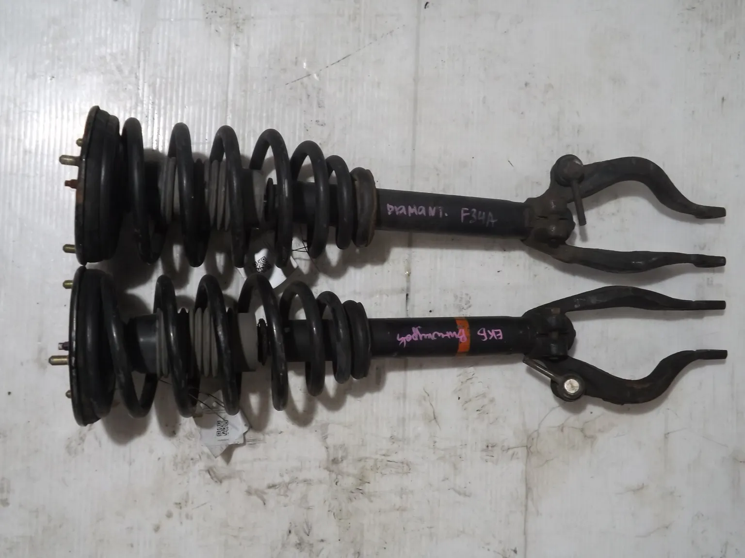 Стойка подвески MITSUBISHI DIAMANTE F34 Перед (Пара) (Контрактный) 94603415