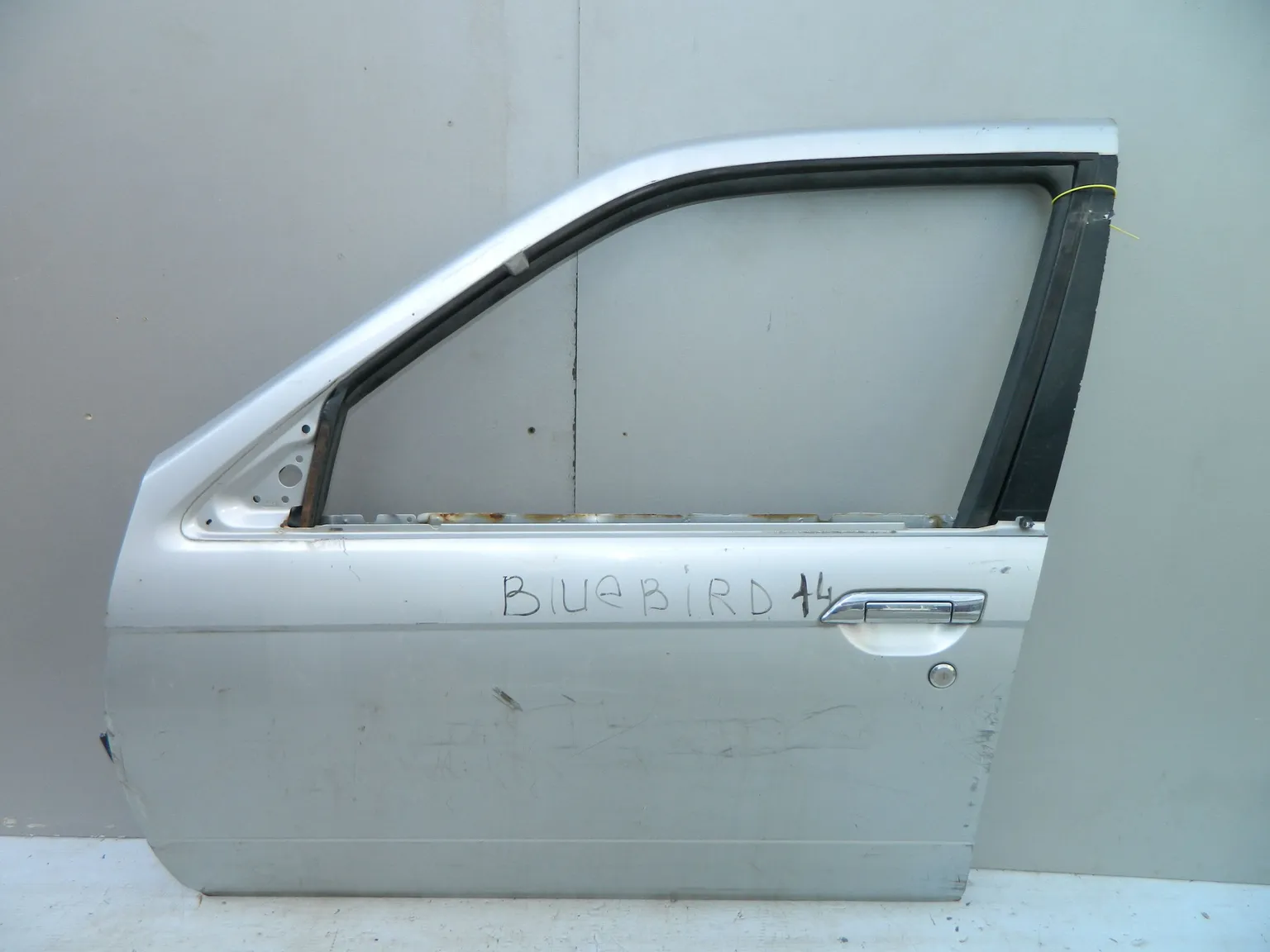 Дверь NISSAN BLUEBIRD U14 Перед Лев (Контрактный) 40951935 H01018E030