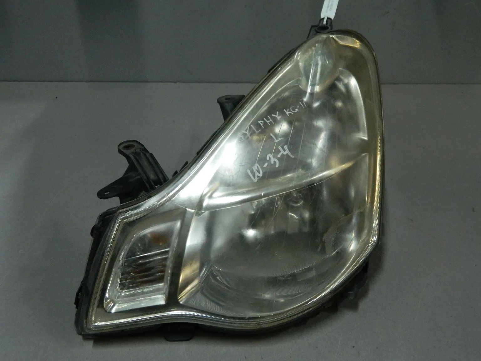 Фара NISSAN BLUEBIRD SYLPHY KG11 Перед Лев (Контрактный) 68000770