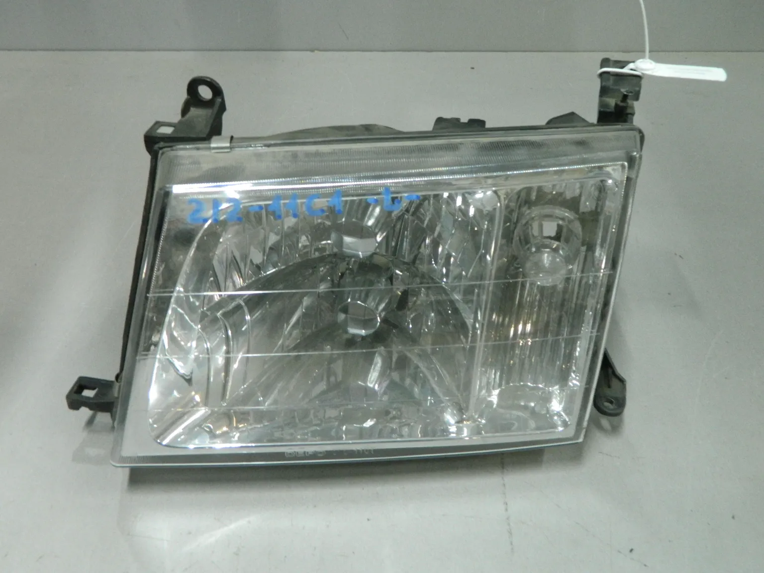 Фара TOYOTA LAND CRUISER FZJ100 Перед Лев (Новый) 03344458