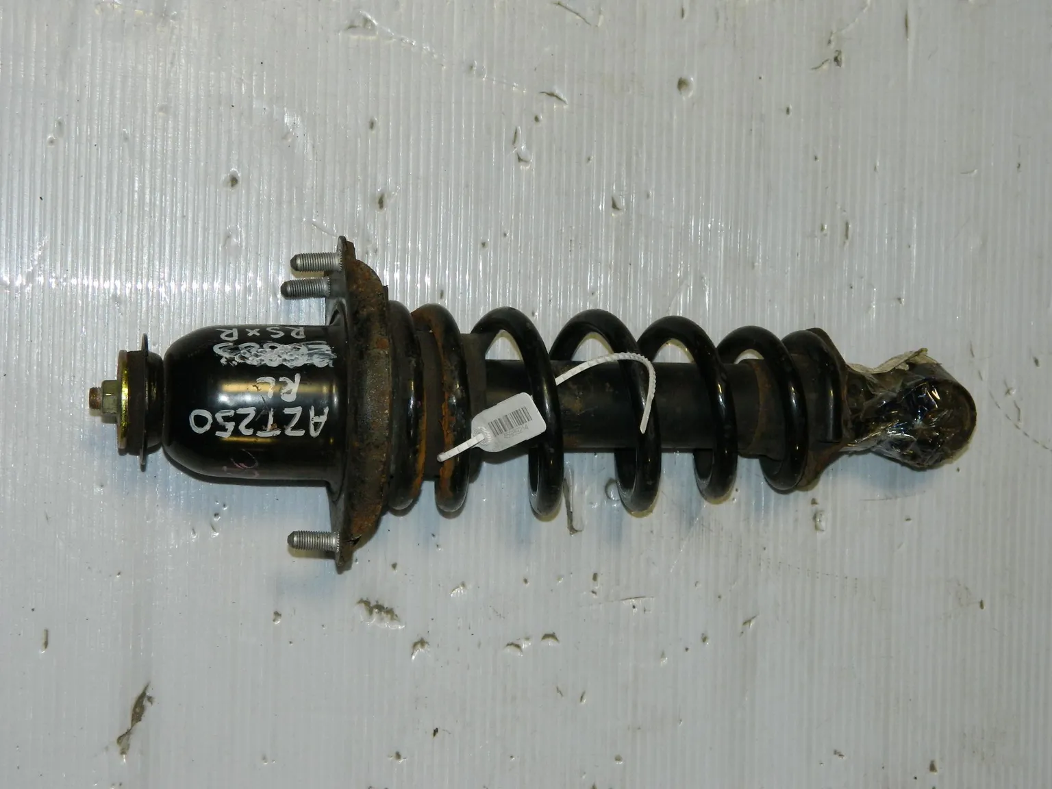 Стойка подвески TOYOTA AVENSIS AZT250 Зад Лев (Контрактный)