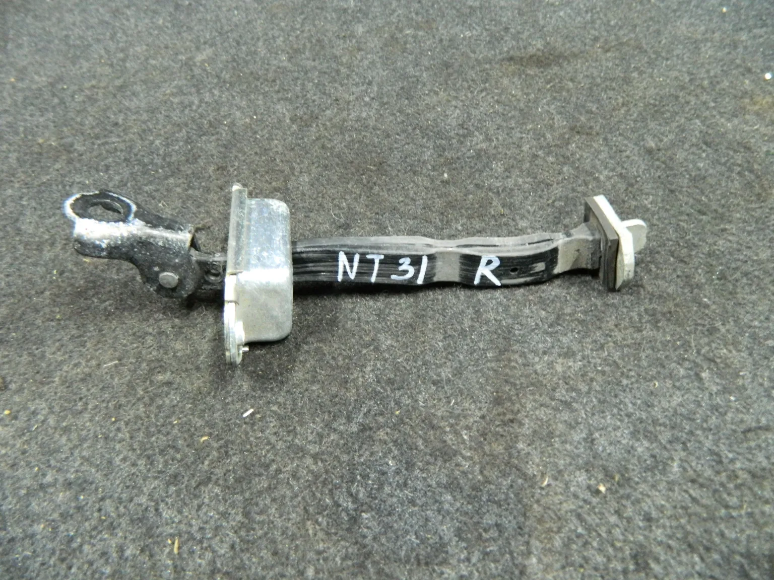 Ограничитель двери NISSAN X-TRAIL T31 Перед Прав (Контрактный) 1102640127