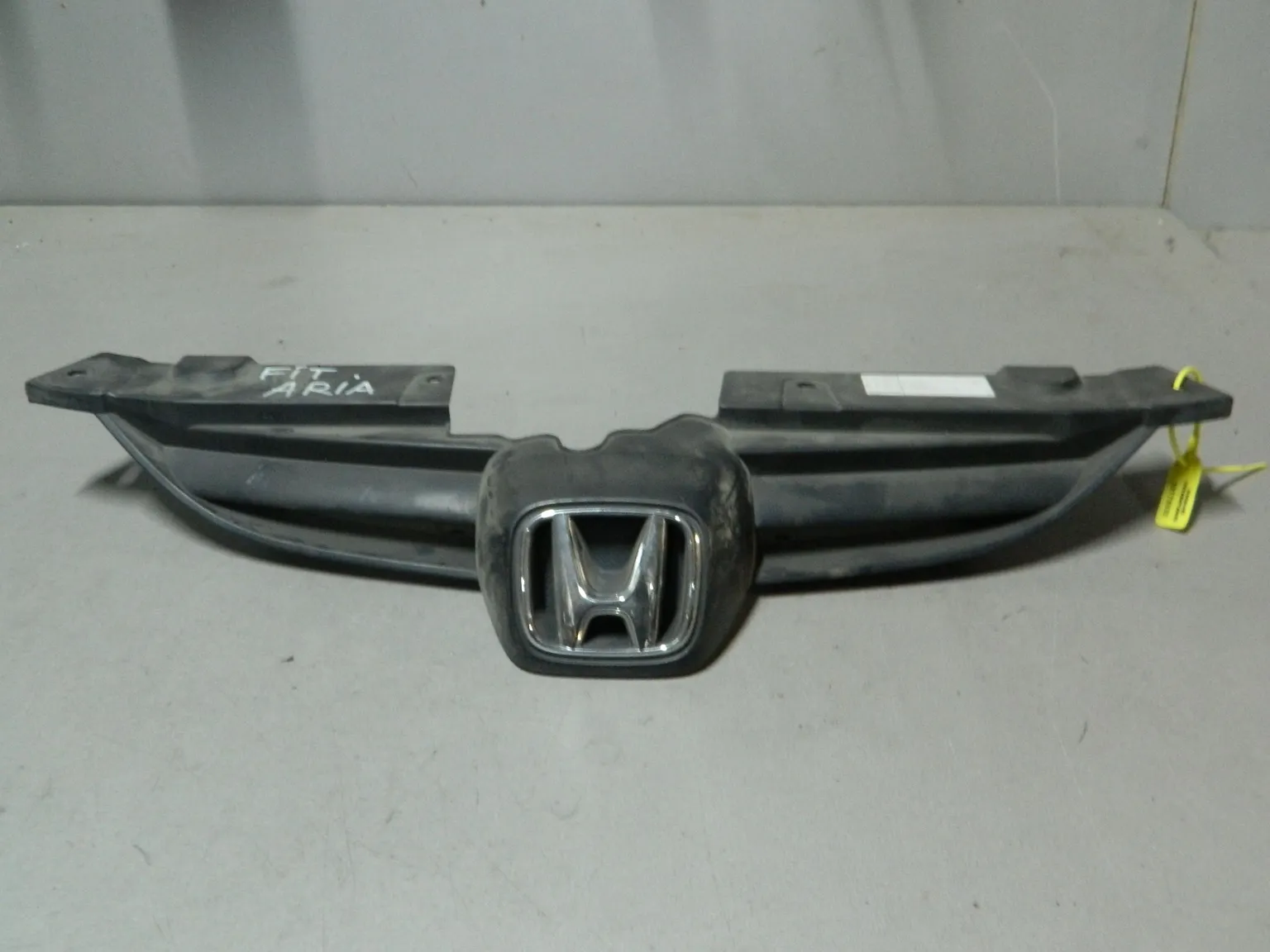 Решетка радиатора HONDA FIT ARIA GD9 (Контрактный) 79773032