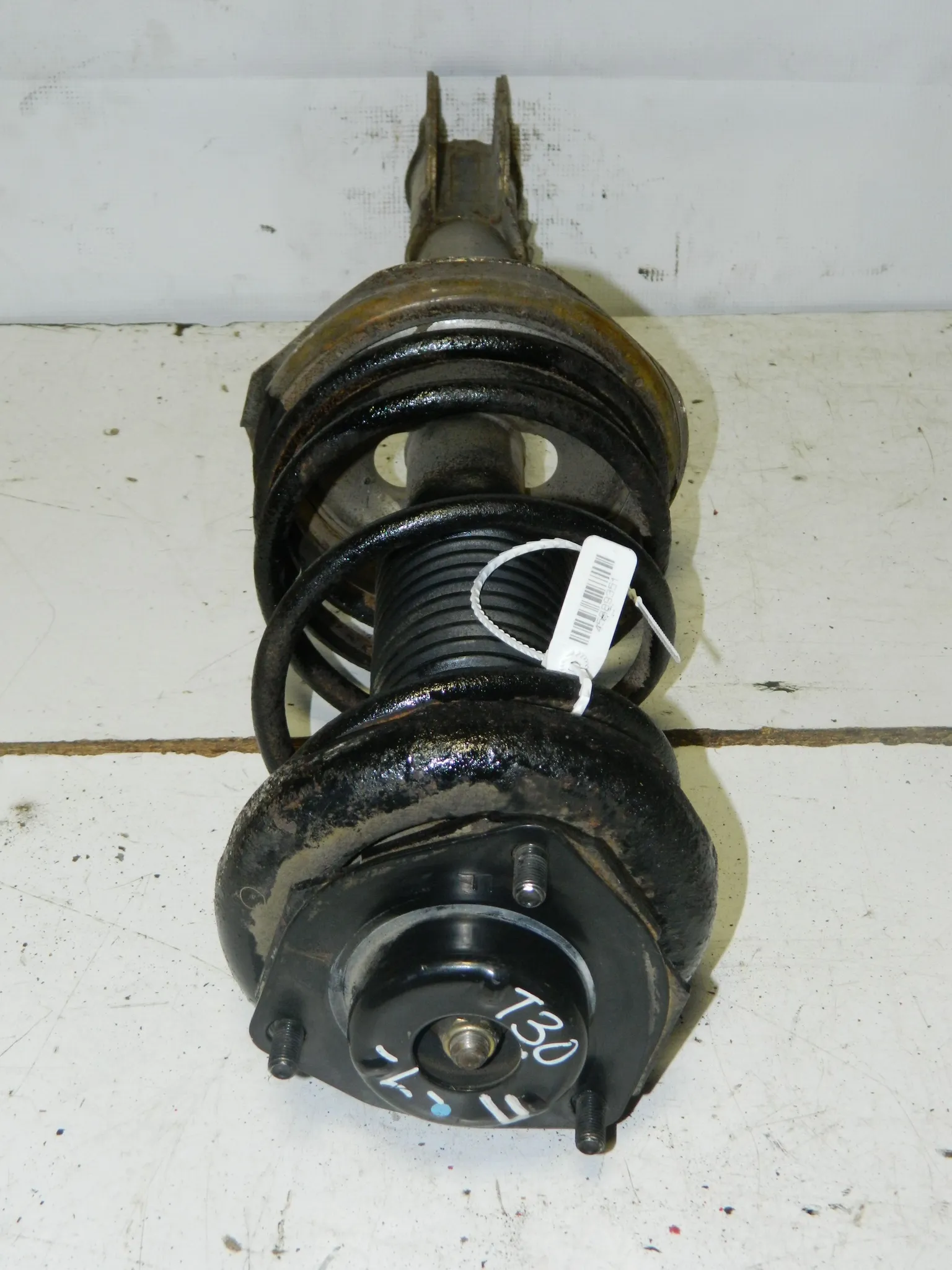 Стойка подвески NISSAN X-TRAIL NT30 Зад Лев (Контрактный) 45989351